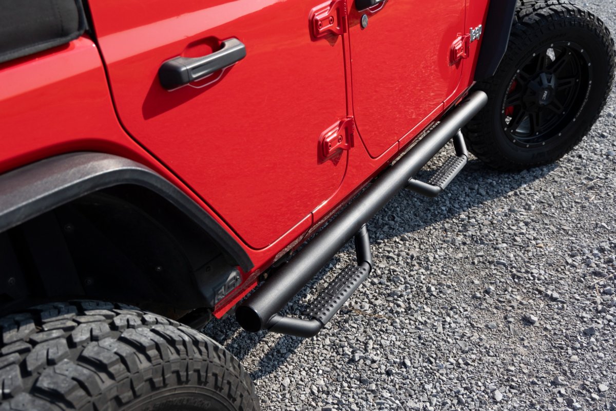 Jeep Wrangler Nerf Steps - Wheel to Wheel - Rough Country - 4 Door, Integrated Stone Guards - '07-'10